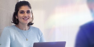 woman in front of desk