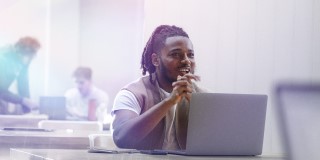 woman in front of desk woman in front of desk