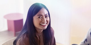 woman in front of desk